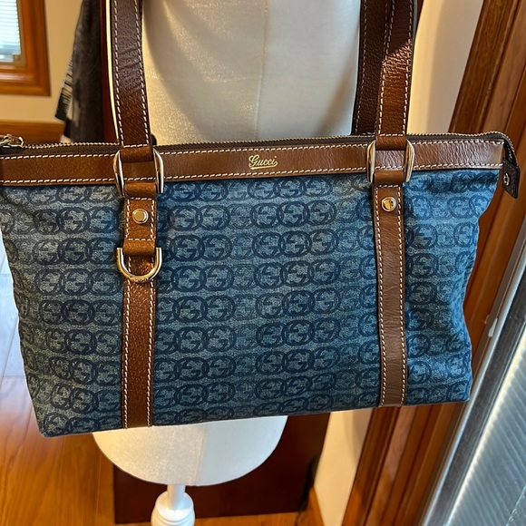 Gucci Handbags - Gucci logo blue canvas with leather trim.